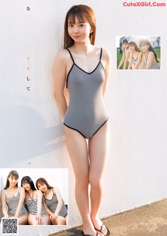 A woman in a gray and black bathing suit posing for a picture.